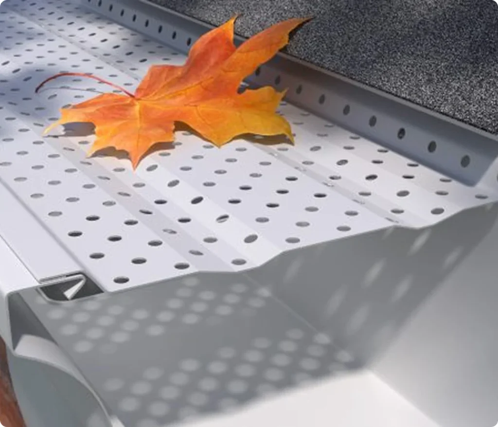Gutter guard keeping leaves out of a seamless gutter