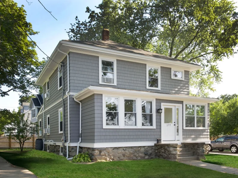 Tinton Falls NJ 4 Two-story home with new gray shake siding and a stone foundation in Tinton Falls, NJ