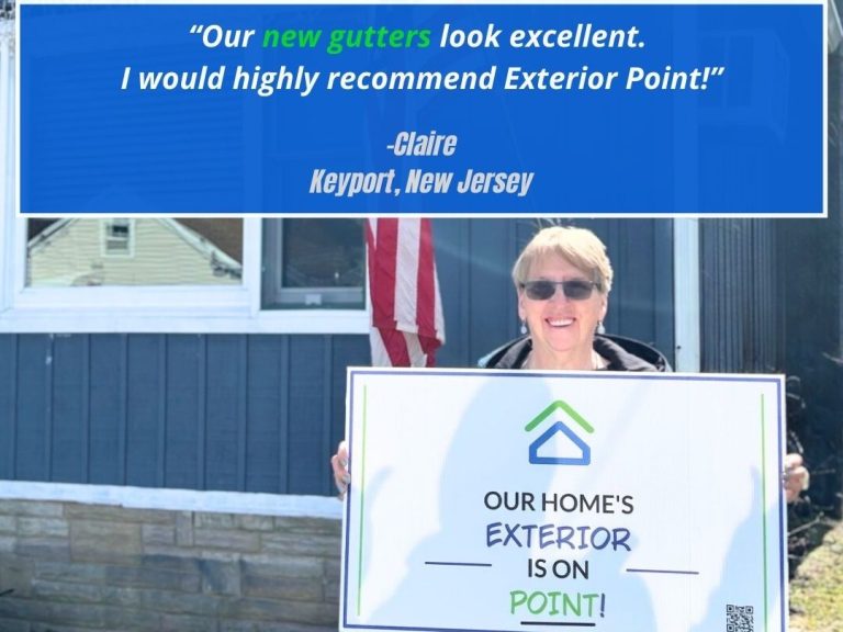 Happy homeowner with new gutters installed near Cliffwood, New Jersey