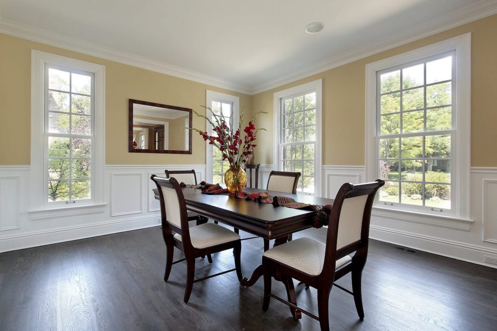 Dining room with new white replacement windows