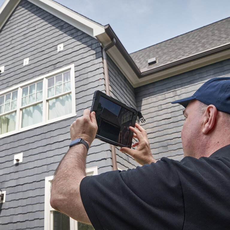 Exterior Point project manager documenting a roof project on a home in Colts Neck, NJ