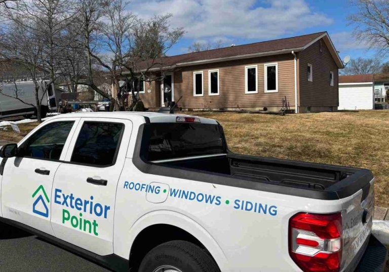 Exterior Point truck outside a ranch home during a window installation in Lakewood, NJ