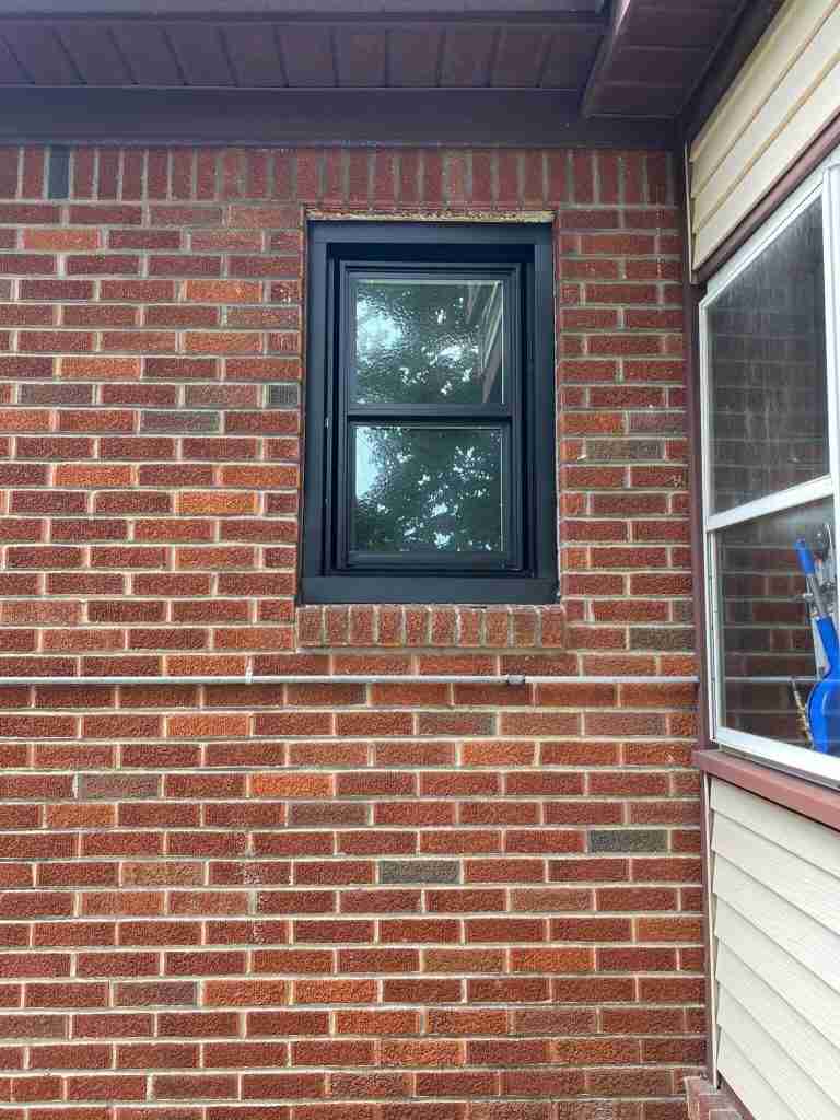 black window with black capping