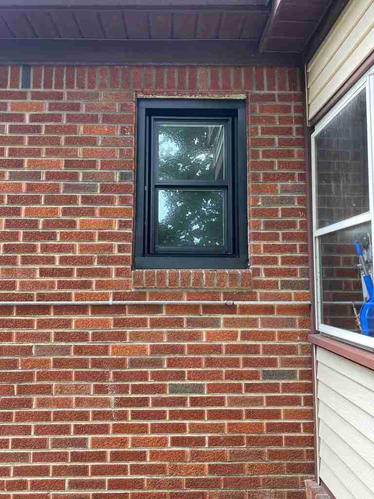black window with black capping
