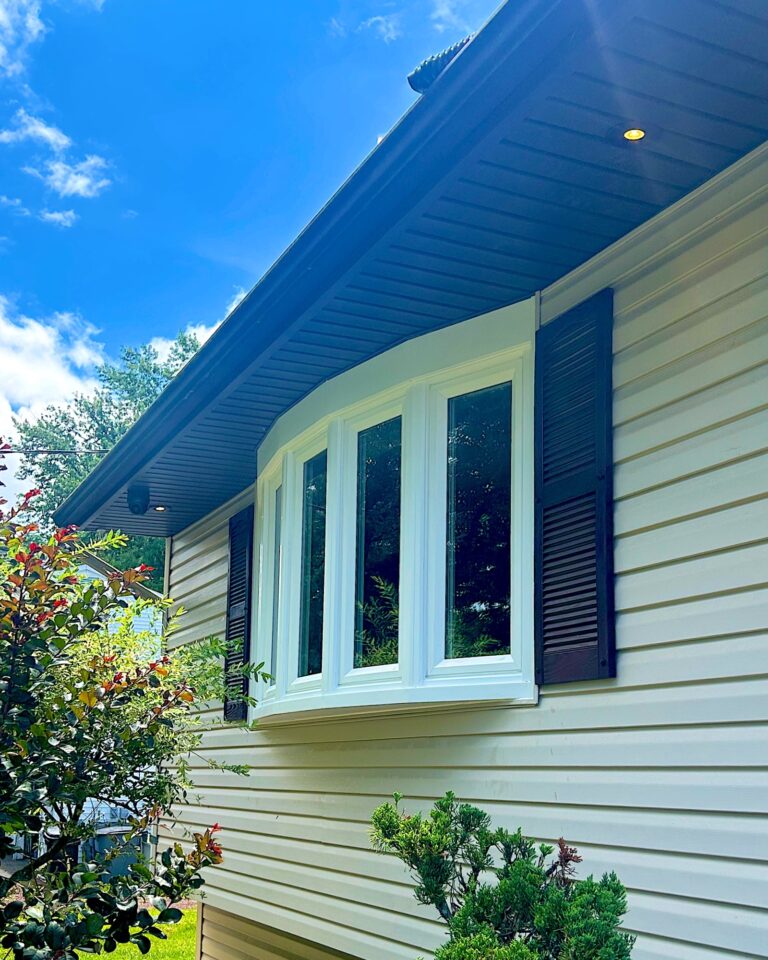 Millstone Township NJ 7 New white bay window with dark shutters on a home in Manalapan, NJ