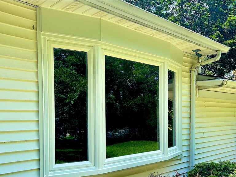 Millstone Township NJ 3 New white bay window in light vinyl siding on a home in Millstone Township, NJ