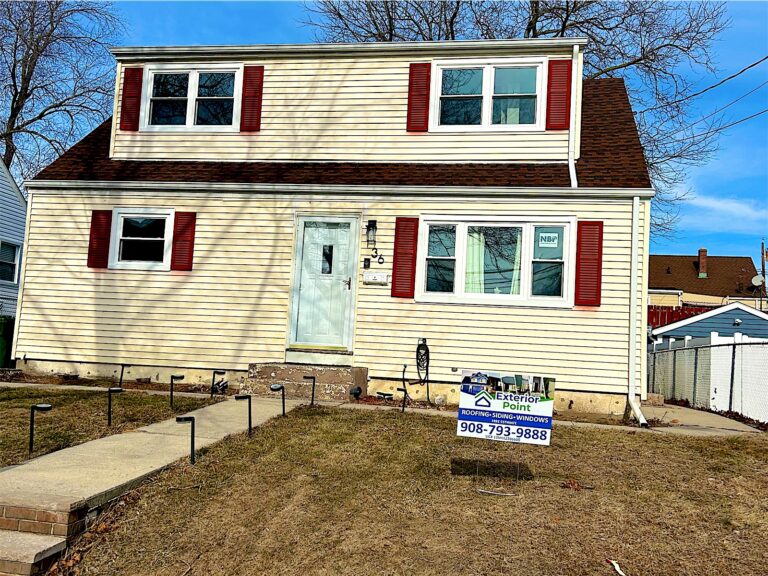 Exterior Point yard sign in front of a Cape Cod with red shutters in Sayreville, NJ