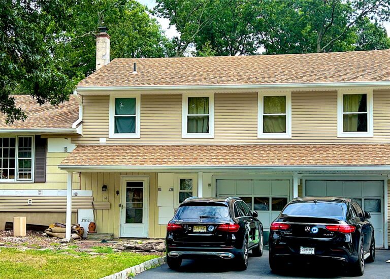 Two-story colonial with a new architectural shingle roof in Piscataway, NJ