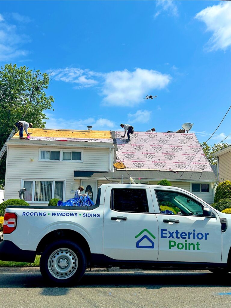 Exterior Point truck parked outside while the crew installs a new roof in Iselin, next to Edison, NJ