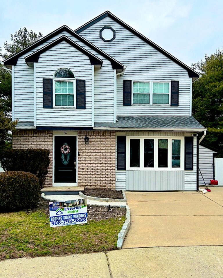 Exterior Point yard signs in front of a white colonial in Old Bridge, NJ