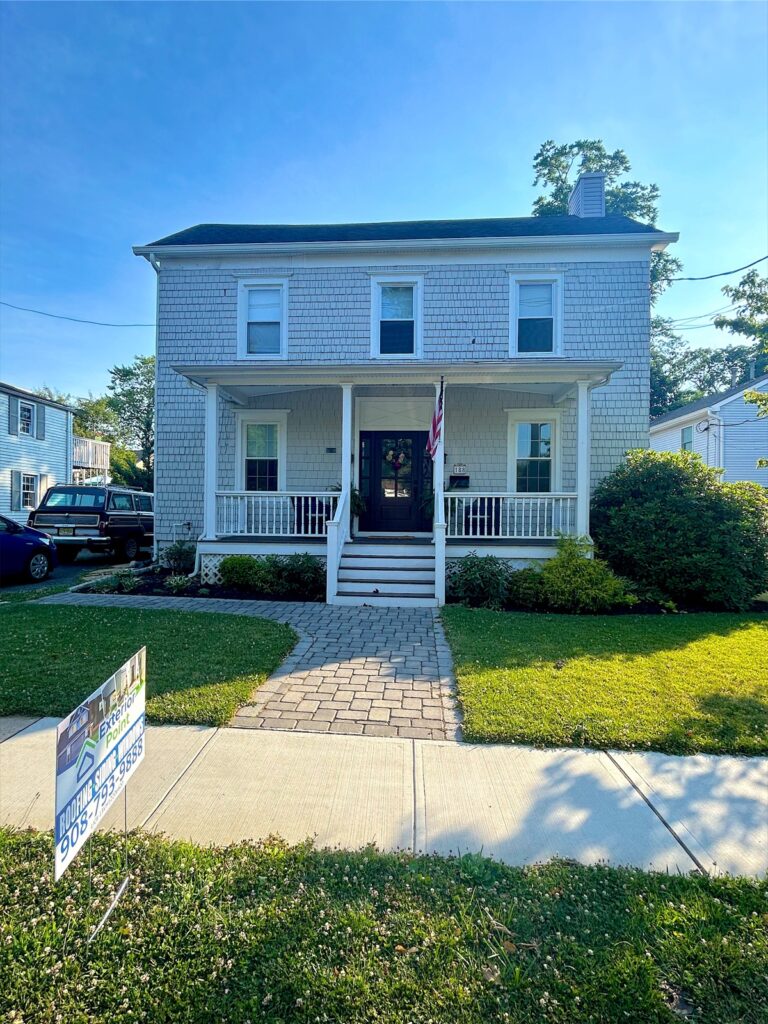 Exterior Point yard sign in front of a white colonial in Red Bank, NJ