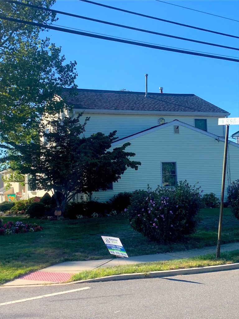 Exterior Point yard sign in front of a white home in the Hazlet area, NJ