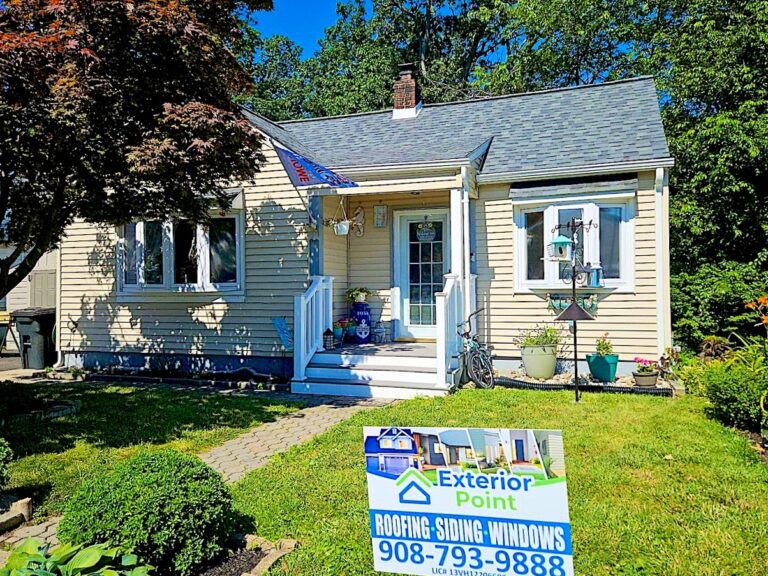 Keansburg NJ 5 Cape Cod home with a new roof and an Exterior Point yard sign in Keyport, NJ