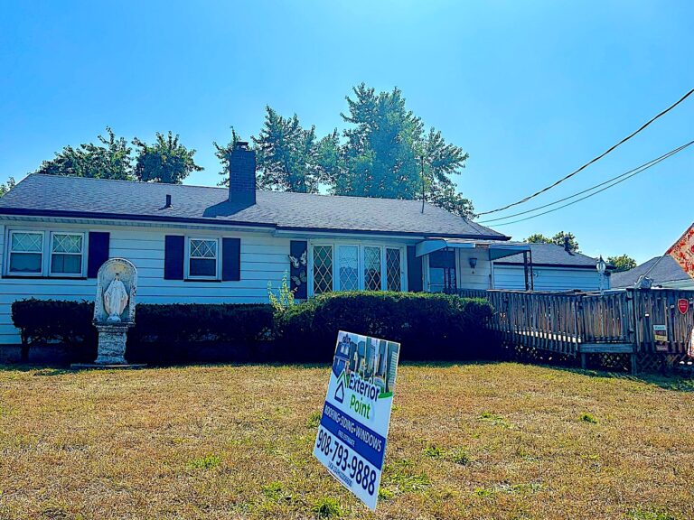 Matawan NJ 6 Exterior Point yard sign in front of a white ranch home in Holmdel, NJ