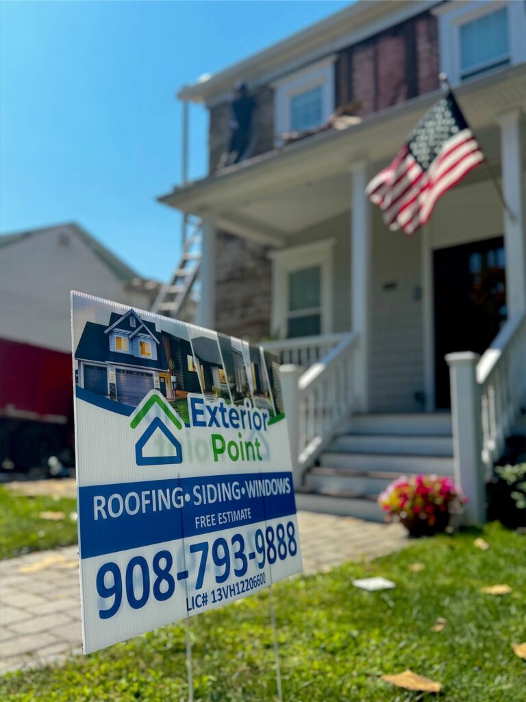 Exterior Point yard sign in front of a home with an American flag in Red Bank, NJ