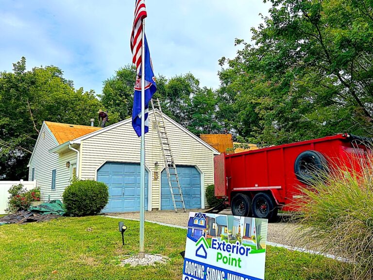 Exterior Point yard sign and dumpster during a roof replacement on a home in Neptune City, NJ
