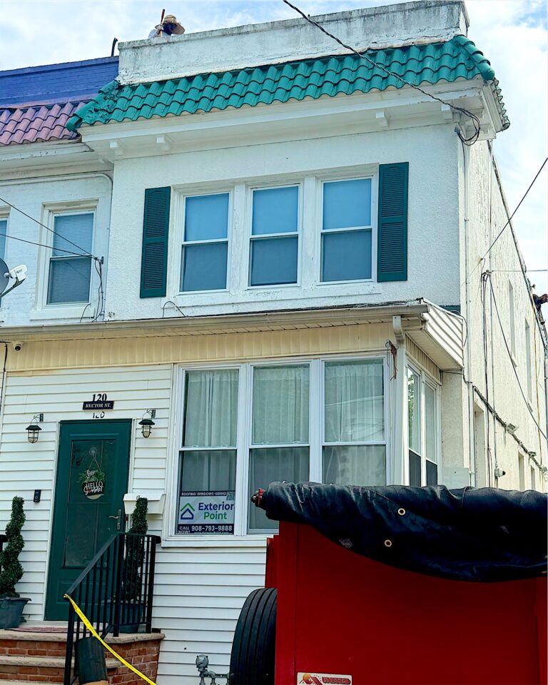 Two-story home during an exterior renovation in Perth Amboy, NJ