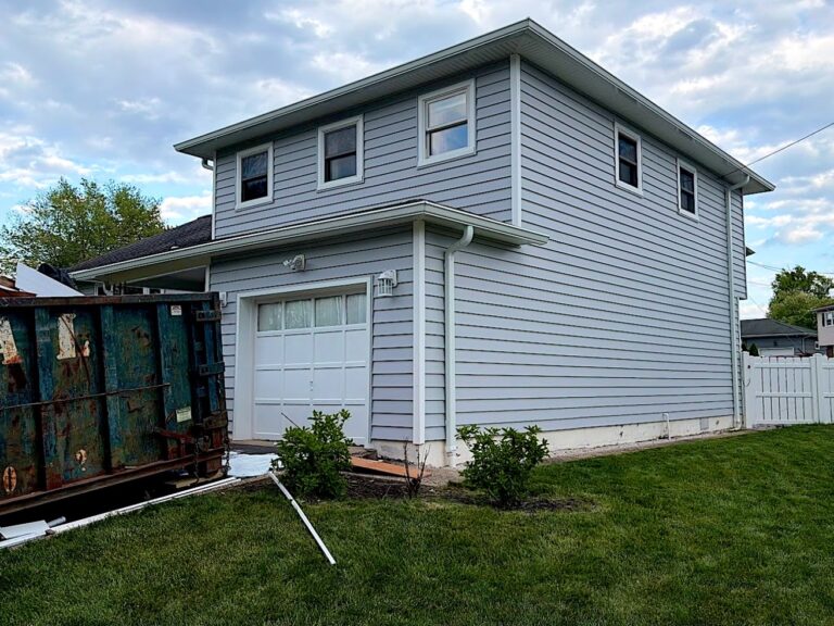 Colonial with new gray siding in Woodbridge, NJ