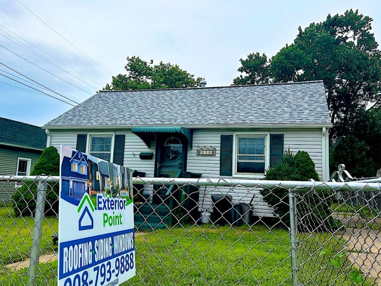Matawan NJ 3 Cape Cod with a new gray shingle roof and Exterior Point yard sign in Keyport, NJ
