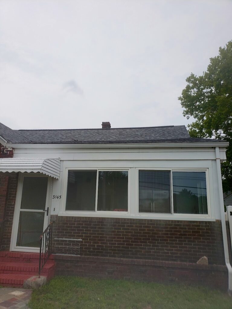 South River NJ 3 New gray shingle roof over an enclosed porch on a home in Sayreville, NJ