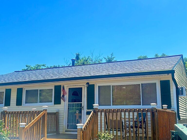 Ranch home with a new architectural shingle roof and a new deck in Toms River, NJ