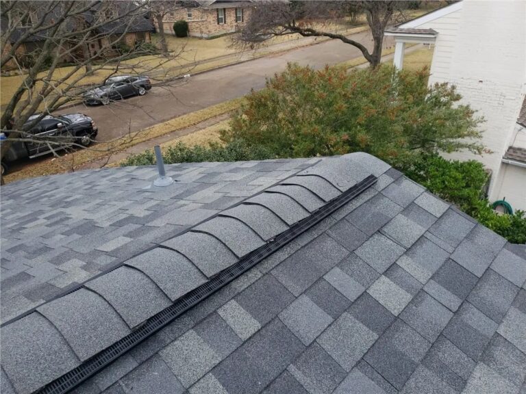 New gray architectural shingles and ridge vent on a home in Shrewsbury, NJ