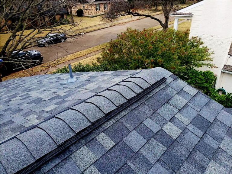 New architectural shingles and ridge vent on a roof in Shrewsbury, NJ