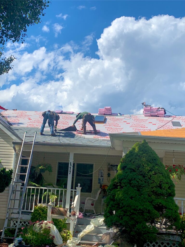 Exterior Point roofing crew installing a new roof in Oceanport, NJ