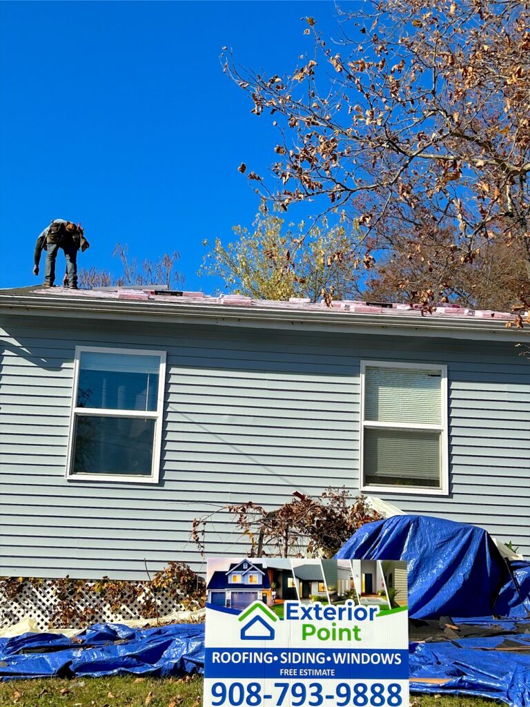 Exterior Point crew on the roof during a roof replacement in Parlin, NJ