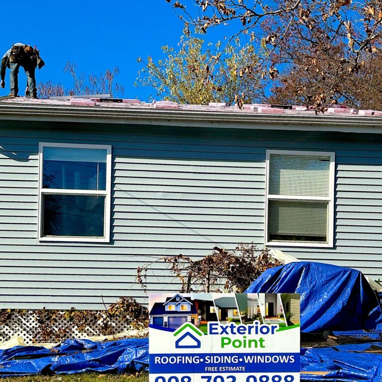 Exterior Point crew on the roof during a roof replacement in Parlin, NJ