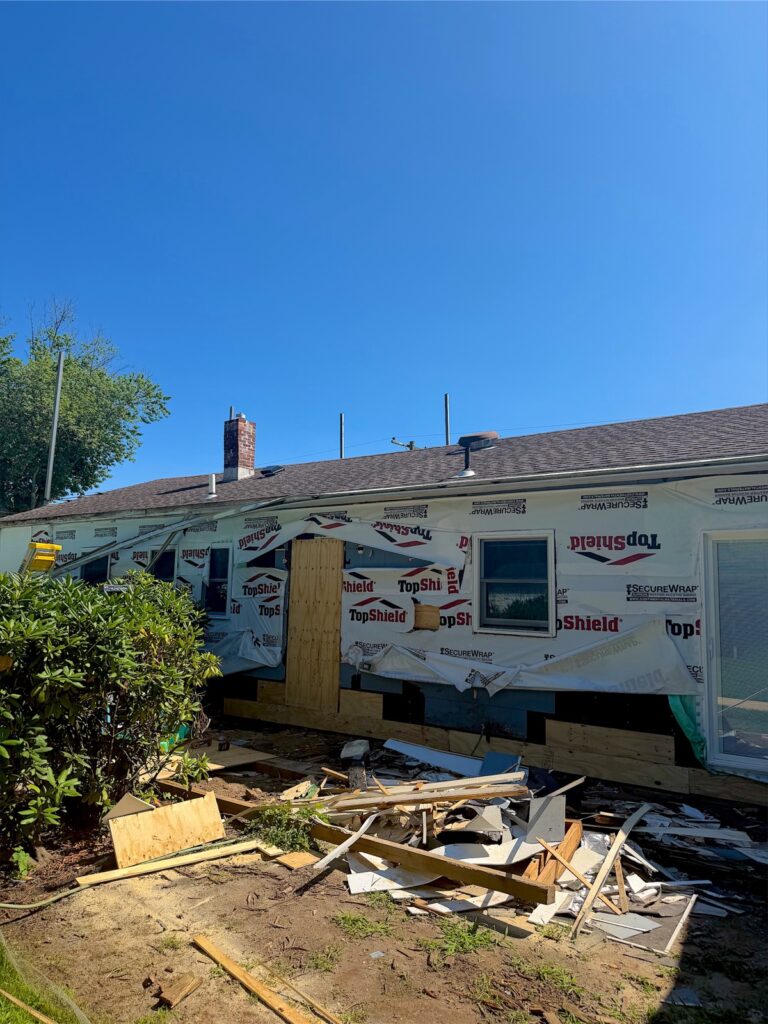 Neptune, NJ 5 Old siding removed and house wrap installed during a siding replacement in Neptune, NJ
