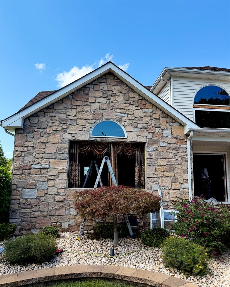 Exterior Point crew replacing windows on a stone-front home in Kendall Park, NJ