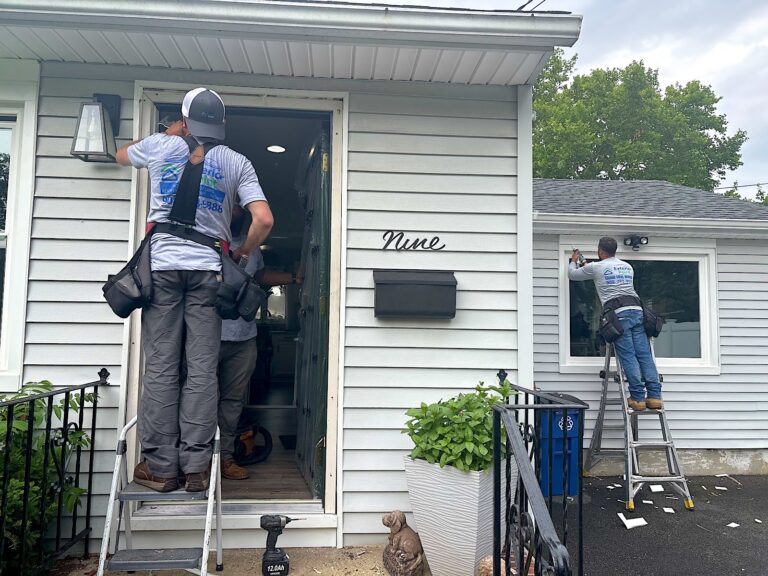 Exterior Point installers replacing a window and entry door on a home in Holmdel, NJ