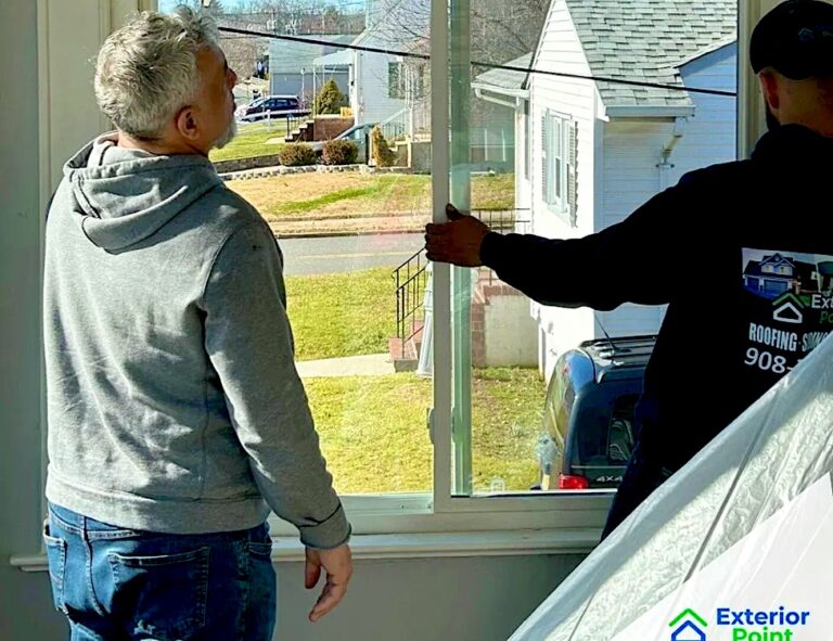 Exterior Point installer walking a homeowner through a new window installation in South Amboy, NJ