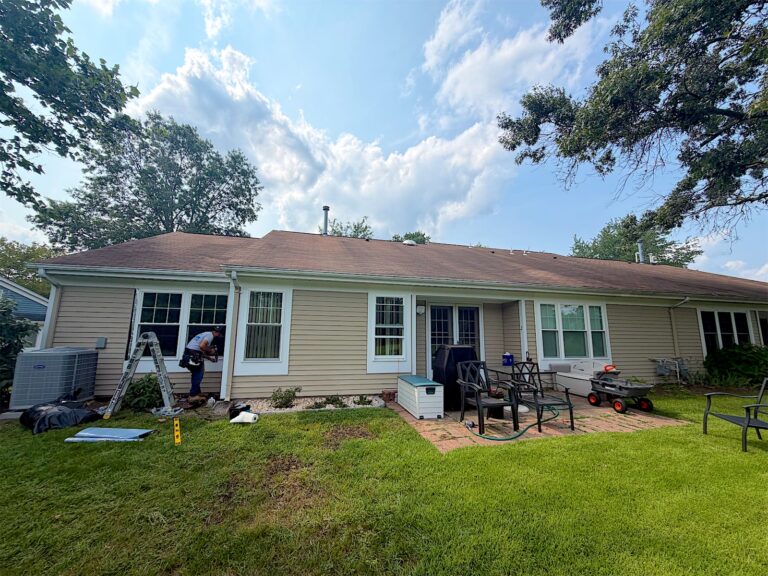 Exterior Point crew installing new windows on the back of a ranch home in Manchester, NJ