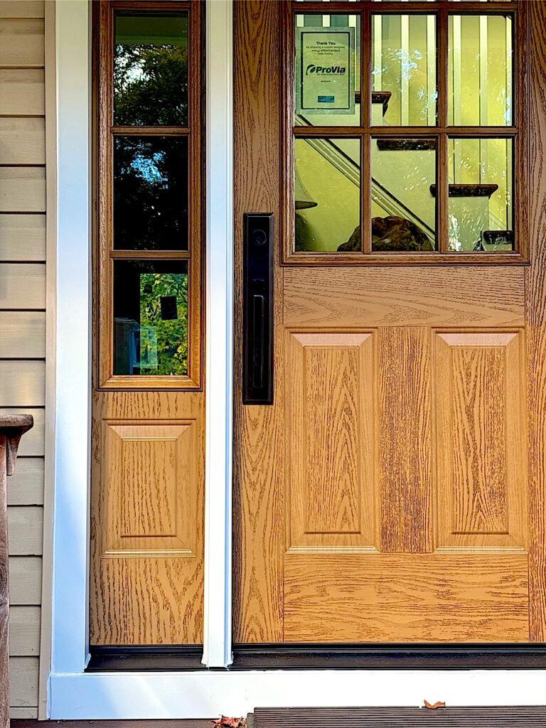 Keansburg NJ 8 New wood-grain entry door with a glass sidelight in Little Silver, NJ